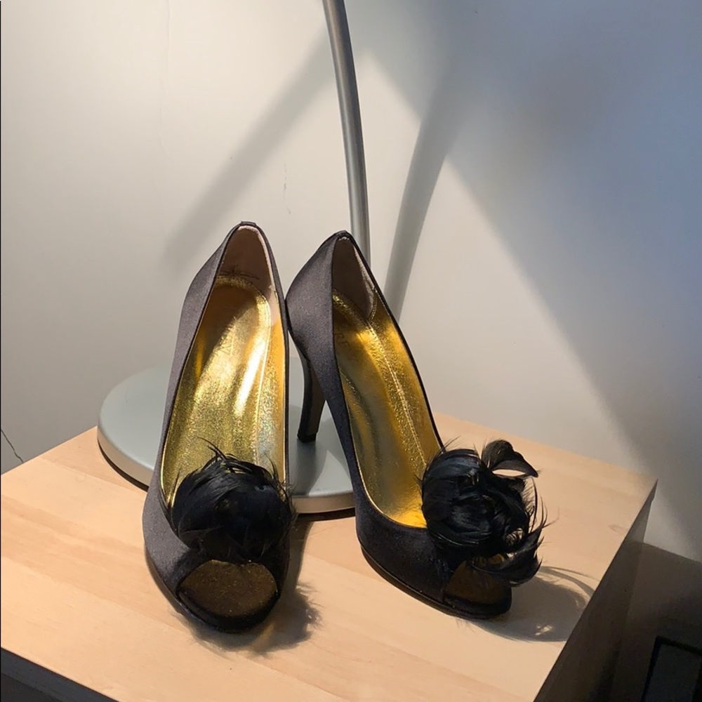 Black satin rose feathered heels.